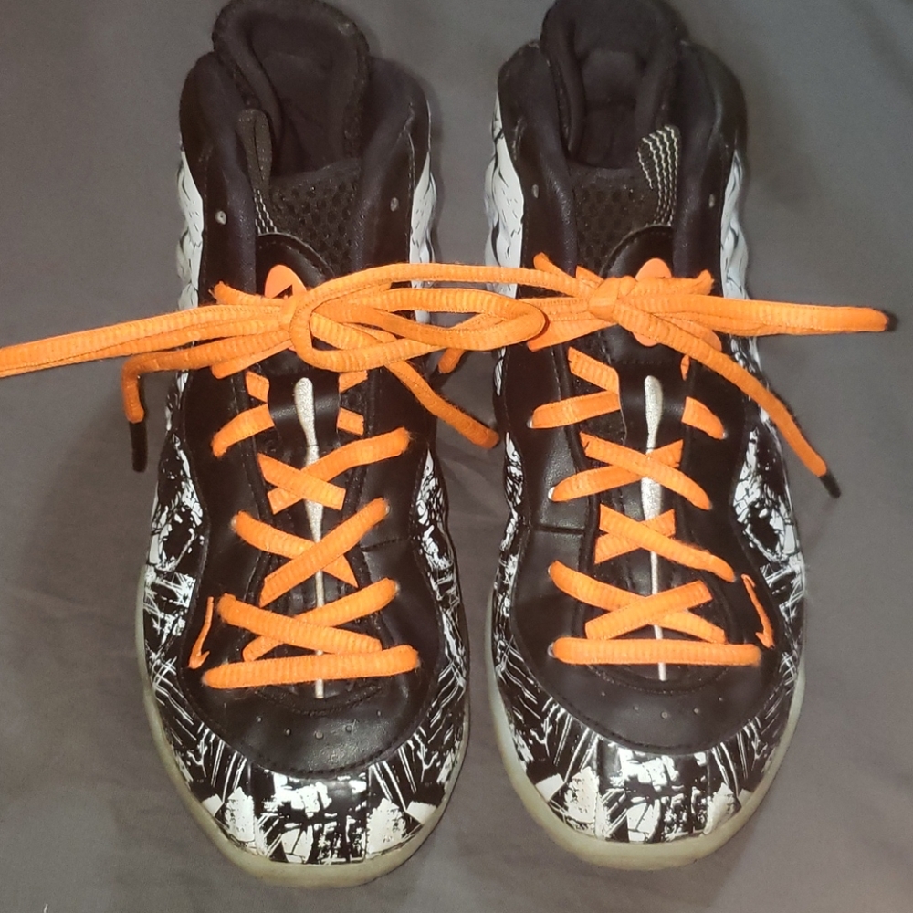 Nike foamposite. Black and white with orange laces